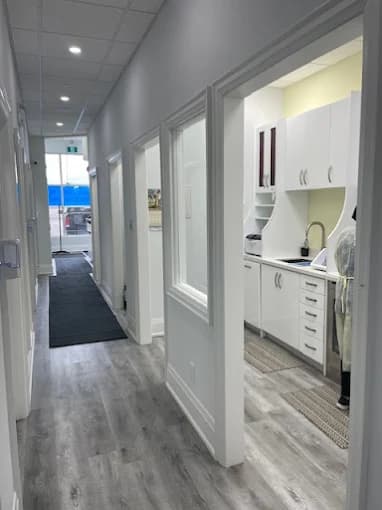 Hallway leading to the treatment rooms at Gardenbrooke Dental